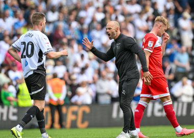 Paul WARNE of Derby County FC (Head Coach / Manager) celebrates winning the match with Callum ELDER of Derby County FC during the Sky Bet Championship match Derby County vs Middlesbrough at Pride Park Stadium, Derby, United Kingdom, 17th August 2024 clipart