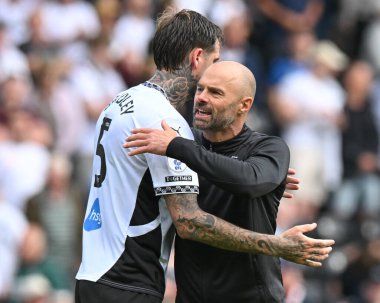 Paul WARNE of Derby County FC (Head Coach / Manager) celebrates winning the match with Sonny BRADLEY of Derby County FC during the Sky Bet Championship match Derby County vs Middlesbrough at Pride Park Stadium, Derby, United Kingdom, 17th August 2024 clipart