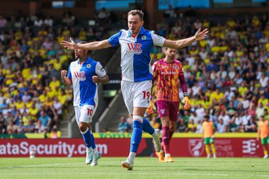 Blackburn Rovers 'dan Ryan Hedges, takımın 17 Ağustos 2024' te Carrow Road, Norwich, İngiltere 'de oynanan Sky Bet Şampiyonası maçında attığı ilk golü kutluyor.