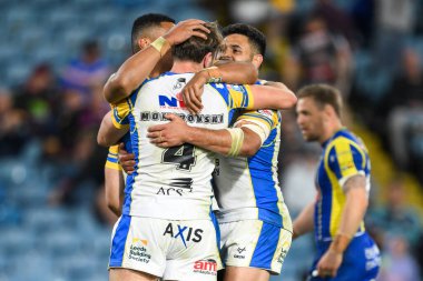 Leeds Rhinos takımından Paul Momirovski, 17 Ağustos 2024 'te Elland Road, Leeds, İngiltere' de oynanan Warrington Wolves-Leeds Rhinos maçında denemesini kutluyor.