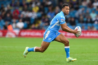 St. Helens 'den Moses Mbye, Wigan Warriors' un 17 Ağustos 2024 'te Elland Road, Leeds' de St. Helens 'e karşı oynadığı Magic Weekend maçında mola verdi.