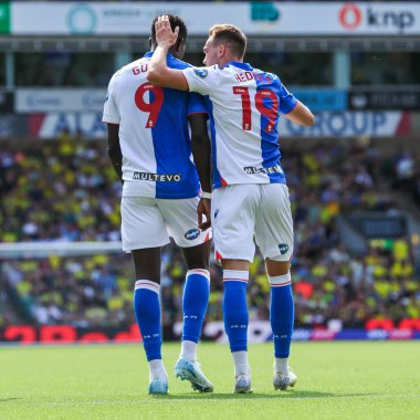 Blackburn Rovers takımından Ryan Hedges, 17 Ağustos 2024 'te Norwich City, Norwich Road, Norwich, İngiltere' de Blackburn Rovers 'a karşı oynanan Sky Bet Şampiyonası maçında takımın ilk golünü attıktan sonra takım arkadaşlarıyla kutluyor.