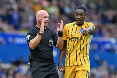 Referee Simon Hooper speaks with Danny Welbeck of Brighton & Hove Albion during the Premier League match Everton vs Brighton and Hove Albion at Goodison Park, Liverpool, United Kingdom, 17th August 2024 clipart