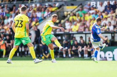 Callum Doyle of Norwich City shoots during the Sky Bet Championship match Norwich City vs Blackburn Rovers at Carrow Road, Norwich, United Kingdom, 17th August 2024 clipart