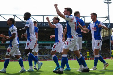 Blackburn Rovers takımından Ryan Hedges, 17 Ağustos 2024 'te Norwich City, Norwich Road, Norwich, İngiltere' de Blackburn Rovers 'a karşı oynanan Sky Bet Şampiyonası maçında takımın ilk golünü attıktan sonra takım arkadaşlarıyla kutluyor.