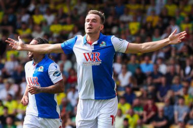 Blackburn Rovers 'dan Ryan Hedges, takımın 17 Ağustos 2024' te Carrow Road, Norwich, İngiltere 'de oynanan Sky Bet Şampiyonası maçında attığı ilk golü kutluyor.