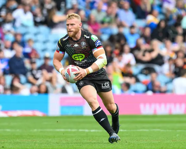 stock image Luke Thompson of Wigan Warriors makes a break during the Magic Weekend match Wigan Warriors vs St Helens at Elland Road, Leeds, United Kingdom, 17th August 2024