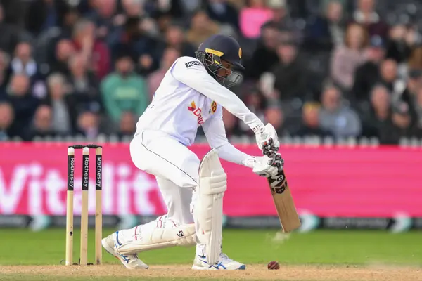 stock image Kamindu Mendis of Sri Lanka plays a shot during the England Men v Sri Lanka 1st Rothesay Test Match Day 3 at Old Trafford, Manchester, United Kingdom, 23rd August 2024