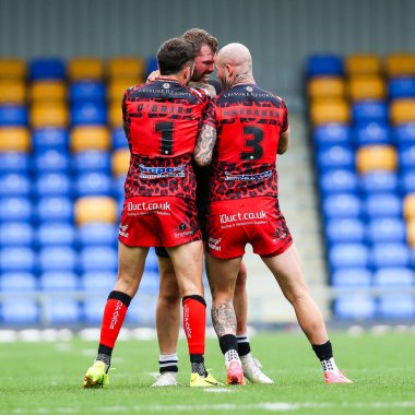 Rob Butler of London Broncos gets into a scrap with Gareth OBrien and Zak Hardaker of Leigh Leopards during the Betfred Super League Round 23 match London Broncos vs Leigh Leopards at Plough Lane, Wimbledon, United Kingdom, 25th August 2024 clipart