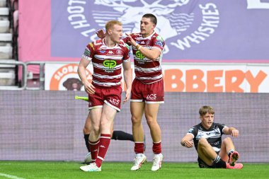 Wigan Warriors takımından Zach Eckersley, 25 Ağustos 2024 'te Wigan Stadyumu' nda oynanan Betfred Süper Lig 23. Maçı 'nda Wigan Warriors' a karşı Hull FC maçında 8-0 kazanma çabasını kutluyor.