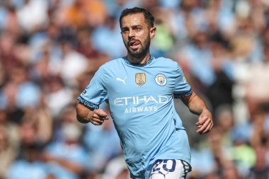 Manchester City 'den Bernardo Silva, 24 Ağustos 2024' te Etihad Stadyumu 'nda oynanan Premier League maçında dilini dışarı çıkardı.