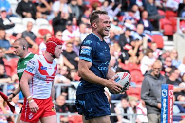 Hull KR 'dan Joe Burgess, Betfred Süper Lig 23. Raundda St Helens vs Hull KR maçında 24 Ağustos 2024' te St Helens Stadyumu 'nda 0-20 Hull' a ulaşma çabasını kutluyor.