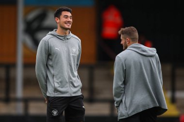 Blackpool 'dan Elkan Baggott, 24 Ağustos 2024' te Birleşik Krallık 'taki Abbey Stadyumu' nda oynanan Cambridge United-Blackpool maçından önce geldi.
