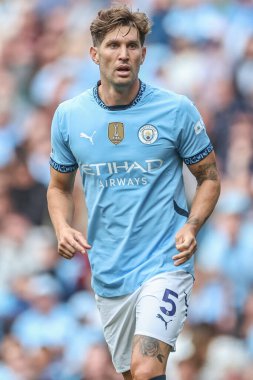 Manchester City - Manchester City maçı sırasında John Stones Etihad Stadyumu, Manchester, İngiltere, 24 Ağustos 2024