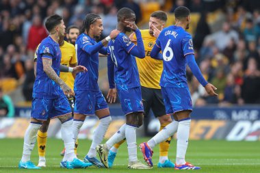 Chelsea 'den Nicolas Jackson, Premier Lig maçında kulaklarına Wolverhampton Wanderers' ın Chelsea 'ye karşı Molineux, Wolverhampton, Birleşik Krallık' ta 25 Ağustos 2024 'te oynadığı maçta işaret veriyor.