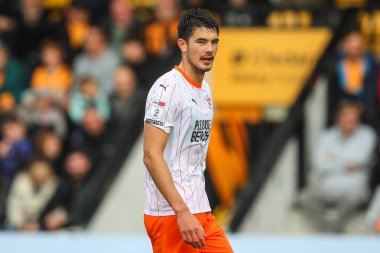 Blackpool takımından Elkan Baggott, 24 Ağustos 2024 'te Cambridge United ve Blackpool maçında Abbey Stadyumu' nda karşı karşıya geldi.