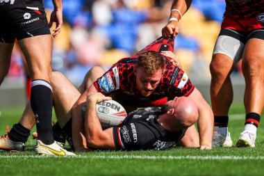 Lee Kershaw of London Broncos is tackled during the Betfred Super League Round 23 match London Broncos vs Leigh Leopards at Plough Lane, Wimbledon, United Kingdom, 25th August 2024 clipart