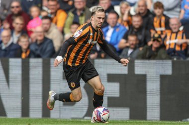 Liam Millar of Hull City breaks with the ball during the Sky Bet Championship match Hull City vs Millwall at MKM Stadium, Hull, United Kingdom, 24th August 2024 clipart