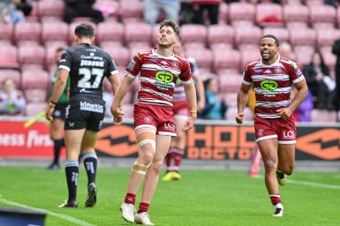 Wigan 'dan Jack Farrimond, 25 Ağustos 2024' te İngiltere 'nin Wigan Stadyumu' nda oynanan Betfred Süper Lig 23. Raundda Wigan Warriors Hull FC maçında 20-4 kazanma çabasını kutluyor.