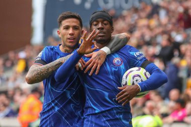 Chelsea 'den Noni Madueke, Premier Lig maçında Chelsea ile Molineux, Wolverhampton, Birleşik Krallık, 25 Ağustos 2024' te oynanan maçta 2-5 'lik galibiyetini kutluyor ve hat-trick' ini kazanıyor.