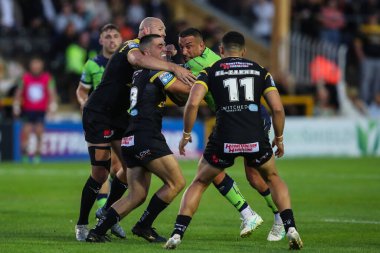 Warrington Wolves takımından Paul Vaughan, 23 Ağustos 2024 'te oynanan Betfred Süper Lig karşılaşmasında Castleford Tigers' a karşı Warrington Wolves 'un The Mend-A-Hose Jungle, Castleford, Birleşik Krallık' ta oynadığı karşılaşmada mücadele etti.