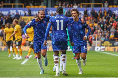 Chelsea 'den Joo Flix, Premier League maçında Wolverhampton Wanderers Chelsea' ye karşı 25 Ağustos 2024 'te Molineux, Wolverhampton, İngiltere' de 2-6 'lık galibiyet golünü kutluyor.