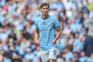 Manchester City - Manchester City maçı sırasında John Stones Etihad Stadyumu, Manchester, İngiltere, 24 Ağustos 2024