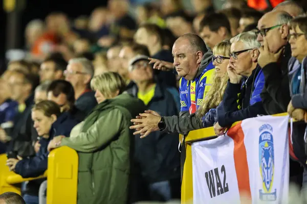 stock image Warrington Wolves fans during the Betfred Super League Round 23 match Castleford Tigers vs Warrington Wolves at The Mend-A-Hose Jungle, Castleford, United Kingdom, 23rd August 2024