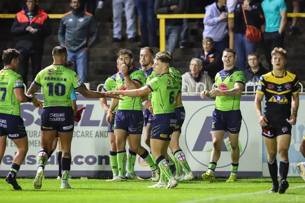 stock image Matty Ashton of Warrington Wolves celebrates his try to make it 6-22 during the Betfred Super League Round 23 match Castleford Tigers vs Warrington Wolves at The Mend-A-Hose Jungle, Castleford, United Kingdom, 23rd August 2024