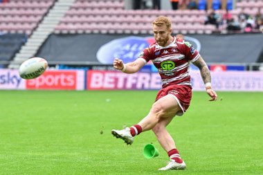 Wigan Warriors takımından Adam Keighran, 25 Ağustos 2024 'te Wigan Stadyumu' nda oynanan Betfred Süper Lig 23. Maçı 'nda Wigan Warriors' a karşı Hull FC maçında takımını 16-4 yenmeye çalışıyor.