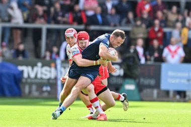 Hull KR 'dan Joe Burgess, Betfred 23. Süper Lig karşılaşmasında St. Helens vs Hull KR karşısında St Helens, St Helens Stadyumu' nda 24 Ağustos 2024 'te St. Helens' li Jonny Vaughan 'a yenildi.