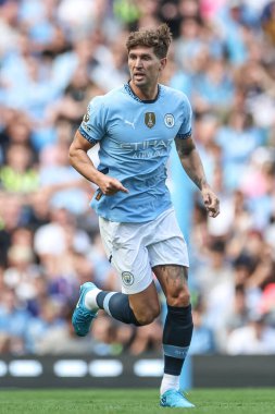 Manchester City - Manchester City maçı sırasında John Stones Etihad Stadyumu, Manchester, İngiltere, 24 Ağustos 2024