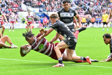 Wigan Warriors 'dan Junior Nsemba, 25 Ağustos 2024' te Wigan Stadyumu 'nda oynanan Betfred Süper Lig 23. Maçı' nda Wigan Warriors 'a karşı Hull FC maçında 14-4' lük galibiyet elde etmeye çalışıyor.