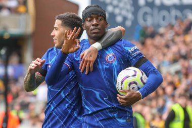 Chelsea 'den Noni Madueke, Premier Lig maçında Chelsea ile Molineux, Wolverhampton, Birleşik Krallık, 25 Ağustos 2024' te oynanan maçta 2-5 'lik galibiyetini kutluyor ve hat-trick' ini kazanıyor.