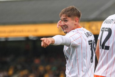 Dom Ballard of Blackpool celebrates his goal to make it 1-4 during the Sky Bet League 1 match Cambridge United vs Blackpool at Abbey Stadium, Cambridge, United Kingdom, 24th August 2024 clipart