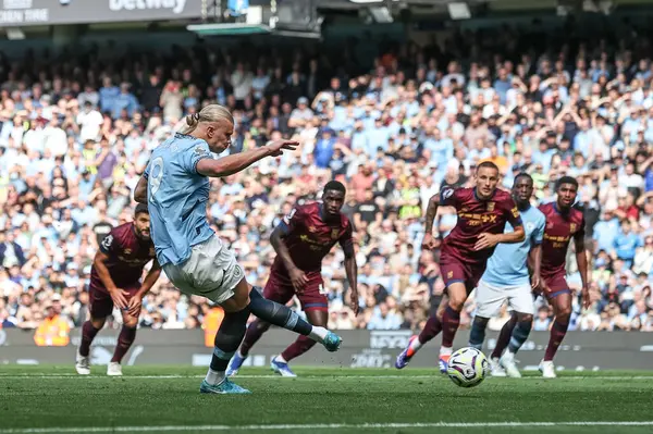 stock image Erling Haaland of Manchester City scores a penalty to make it 1-1 during the Premier League match Manchester City vs Ipswich Town at Etihad Stadium, Manchester, United Kingdom, 24th August 2024