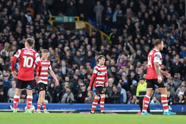 Doncaster Rovers look dejected after Beto of Everton scores a goal to make it 3-0 Everton during the Carabao Cup match Everton vs Doncaster Rovers at Goodison Park, Liverpool, United Kingdom, 27th August 2024 clipart