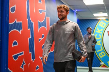 Matthew Pennington of Blackpool arrives ahead of the Carabao Cup match Blackburn Rovers vs Blackpool at Ewood Park, Blackburn, United Kingdom, 27th August 2024 clipart