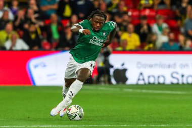 Michael Obafemi of Plymouth Argyle runs with the ball during the Carabao Cup match Watford vs Plymouth Argyle at Vicarage Road, Watford, United Kingdom, 27th August 2024 clipart