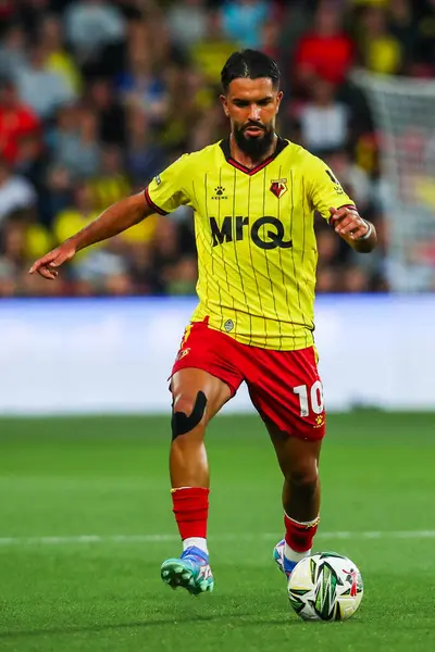 stock image Imran Louza of Watford runs with the ball during the Carabao Cup match Watford vs Plymouth Argyle at Vicarage Road, Watford, United Kingdom, 27th August 2024