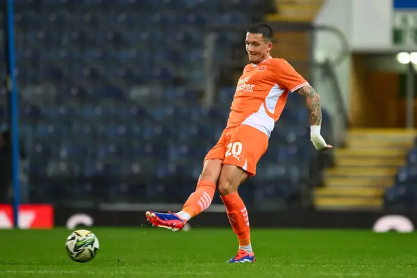 stock image Oliver Casey of Blackpool passes the ball during the Carabao Cup match Blackburn Rovers vs Blackpool at Ewood Park, Blackburn, United Kingdom, 27th August 202