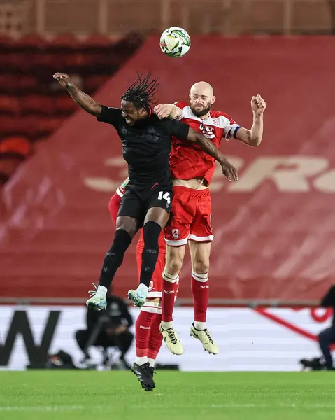 stock image Niall Ennis of Stoke City and Matthew Clarke of Middlesbrough battle for the ball during the Carabao Cup match Middlesbrough vs Stoke City at Riverside Stadium, Middlesbrough, United Kingdom, 27th August 202