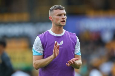 Luke McNally of Burnley warms up ahead of the Carabao Cup match Wolverhampton Wanderers vs Burnley at Molineux, Wolverhampton, United Kingdom, 28th August 2024 clipart