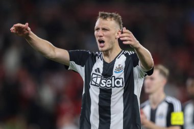 Newcastle United takımından Dan Burn, 28 Ağustos 2024 'te Nottingham Forest, Newcastle United' a karşı oynanan Carabao Kupası karşılaşmasında tam zamanlı sonucu kutluyor.