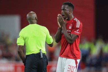 Willy Boly of Nottingham Forest reacts to referee Sam Allison decision during the Carabao Cup match Nottingham Forest vs Newcastle United at City Ground, Nottingham, United Kingdom, 28th August 2024 clipart