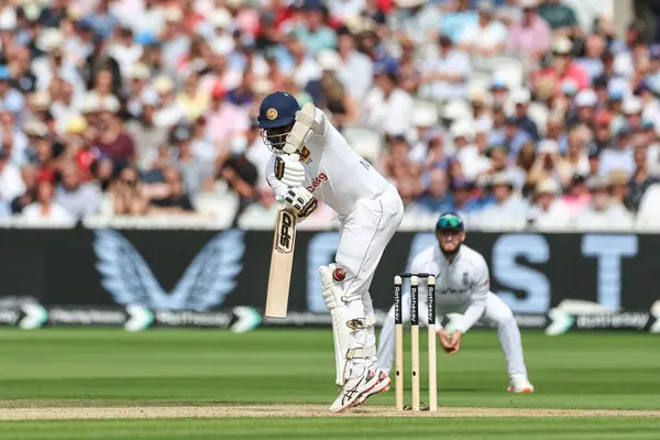 stock image Angelo Mathews of Sri Lanka hits the ball into his knee during the England v Sri Lanka 2nd Rothesay Test Match Day 2 at Lords, London, United Kingdom, 30th August 2024