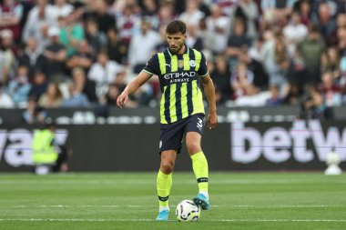 Manchester City 'den Rben Dias Premier League maçında topla birlikte Londra' daki Manchester City 'ye karşı West Ham United, 31 Ağustos 2024
