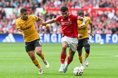 Nottingham Ormanı 'ndan Morgan Gibbs-White Premier Lig maçında Joo Gomes of Wolverhampton Wanderers' ın Nottingham Ormanı 'na karşı Wolverhampton Wanderers maçı sırasında 31 Ağustos 2024' te Nottingham, İngiltere 'de oynandı.