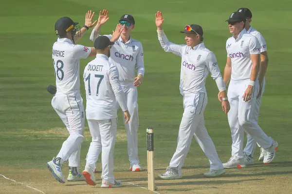 stock image Gus Atkinson of England celebrates with teammates after the dismissal of Dinesh Chandimal of Sri Lanka during the England v Sri Lanka 2nd Rothesay Test Match Day 4 at Lords, London, United Kingdom, 1st September 2024