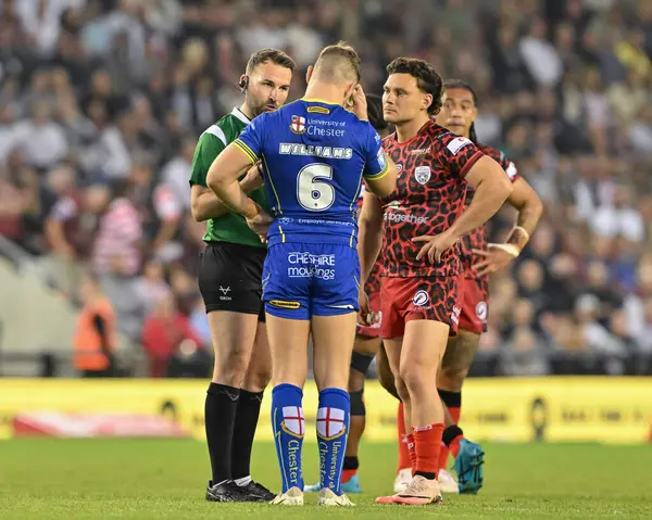 stock image Referee Chris Kendall speaks with George Williams of Warrington Wolves and Lachlan Lam of Leigh Leopards during Betfred Super League Round 24 match Leigh Leopards vs Warrington Wolves at Leigh Sports Village, Leigh, United Kingdom, 30th August 2024